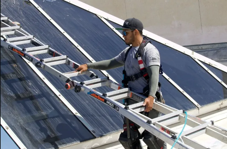 Professional skylight window film installation in progress