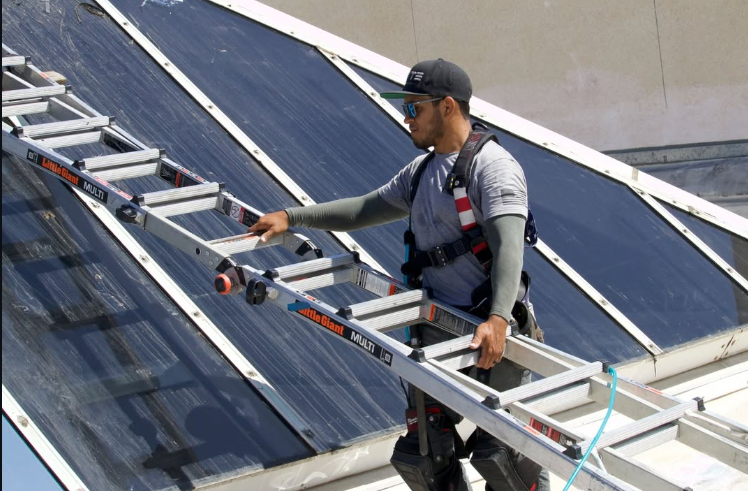 Professional skylight window film installation in progress